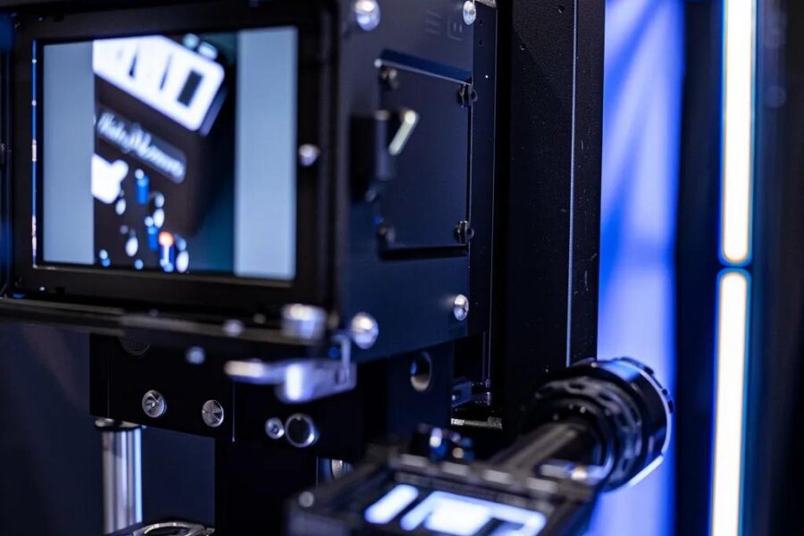 Advanced technology in Halo 360's photo booth with DSLR camera and studio lighting