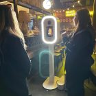 Guests posing at the Halo360 photo booth screen
