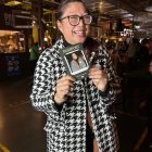 Guest holding her personalised Halo360 polaroid passport print
