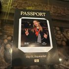 Guest holding her personalised Halo360 polaroid passport print